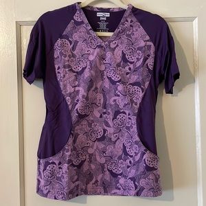 Scrub top. Never worn. Has stretch for comfort. Perfect for healthcare worker.